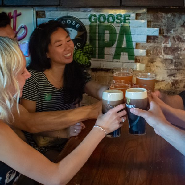 a woman holding a glass of wine