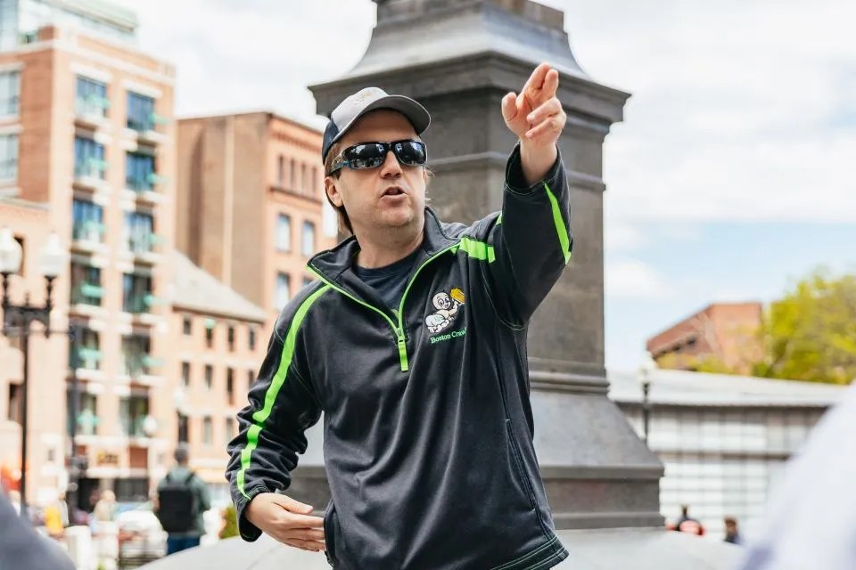 a man standing in front of a building